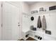 White entryway with built-in bench and storage at 141 Beacon Hill Rd # 13, Lillington, NC 27546