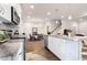 Open concept kitchen with island, dining area, and living room at 141 Beacon Hill Rd # 13, Lillington, NC 27546