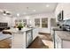 Modern kitchen with granite countertops and island at 141 Beacon Hill Rd # 13, Lillington, NC 27546