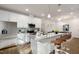 Modern kitchen with a granite island and stainless steel appliances at 141 Beacon Hill Rd # 13, Lillington, NC 27546