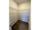 Walk-in pantry with wire shelving for storage at 141 Beacon Hill Rd # 13, Lillington, NC 27546