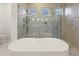 Luxurious soaking tub with marble shower at 43 Laurel Knoll Dr, Pittsboro, NC 27312