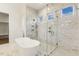 Luxurious bathroom with soaking tub and marble shower at 43 Laurel Knoll Dr, Pittsboro, NC 27312