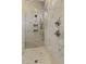 Luxurious marble shower and mosaic tiled floor at 43 Laurel Knoll Dr, Pittsboro, NC 27312