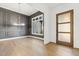 Elegant dining room with hardwood floors, statement lighting, and natural light at 43 Laurel Knoll Dr, Pittsboro, NC 27312