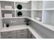 Well-organized pantry with white shelving and countertops offering ample storage space at 43 Laurel Knoll Dr, Pittsboro, NC 27312