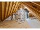 Unfinished attic space, showcasing exposed rafters and ample potential at 125 Cotton Fields Ln # 26, Fuquay Varina, NC 27526
