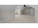 A cozy bedroom with neutral walls, carpeted floor, window and fan at 125 Cotton Fields Ln # 26, Fuquay Varina, NC 27526