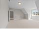 Bedroom featuring neutral walls, carpeted floor, natural light from a window at 125 Cotton Fields Ln # 26, Fuquay Varina, NC 27526