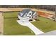 New construction home boasts a two-car garage and a mix of white siding and stone accents at 125 Cotton Fields Ln # 26, Fuquay Varina, NC 27526