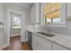 The kitchen features granite countertops, stainless steel appliances and a stainless steel sink at 125 Cotton Fields Ln # 26, Fuquay Varina, NC 27526
