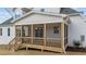 The screened-in porch extends the home's living space outdoors at 125 Cotton Fields Ln # 26, Fuquay Varina, NC 27526
