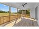 Screened-in porch with wooden floors offers peaceful outdoor living space at 125 Cotton Fields Ln # 26, Fuquay Varina, NC 27526