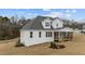 A charming home featuring a cozy screened-in porch perfect for relaxing outdoors at 125 Cotton Fields Ln # 26, Fuquay Varina, NC 27526