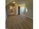 Spacious carpeted bedroom with adjacent bathroom and closet area at 27 Prency Ln, Middlesex, NC 27557