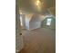 Bedroom with neutral color walls and carpeted floors with large windows at 27 Prency Ln, Middlesex, NC 27557