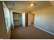 Bedroom with neutral walls, large window and double door closet at 27 Prency Ln, Middlesex, NC 27557