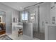 Bathroom features tiled floors, a large tub, a glass shower, and a vanity at 262 Hook Dr # 12, Fuquay Varina, NC 27526