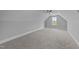 This bedroom has gray walls and carpet, white trim, and one window at 262 Hook Dr # 12, Fuquay Varina, NC 27526