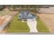Stunning two-story home with a three-car garage, a blue facade, and a long driveway at 262 Hook Dr # 12, Fuquay Varina, NC 27526