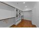Spacious walk-in closet with custom shelving and hardwood floors, offering ample storage at 262 Hook Dr # 12, Fuquay Varina, NC 27526
