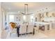 Bright, open-concept dining area connected to the kitchen and living room with modern decor at 600 N Roxboro St # 22, Durham, NC 27701