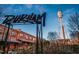 The Durham sign with a vintage water tower in the background against a bright blue sky at 2014 Moody Ln, Durham, NC 27701