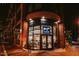 Night view of the Bulledga Urban Market with brick facade and illuminated signage at 2014 Moody Ln, Durham, NC 27701