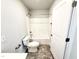 Clean, well-lit bathroom with modern fixtures, including a shower-tub combo at 152 Southern Estates Dr, Sanford, NC 27330
