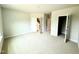 Inviting bedroom features soft carpet, neutral walls and multiple closets for ample storage at 152 Southern Estates Dr, Sanford, NC 27330