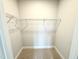Walk-in closet with wire shelving offers ample storage space for an organized home at 152 Southern Estates Dr, Sanford, NC 27330