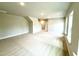 Expansive living area featuring carpet, recessed lights, and large windows for an inviting atmosphere at 152 Southern Estates Dr, Sanford, NC 27330