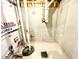 Unfinished basement with concrete walls and basic plumbing fixtures at 303 Bishop Ln, Sanford, NC 27330
