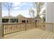 Wooden back deck with railings and a clear view of the neighborhood at 125 Sugar Run Dr # 26, Fuquay Varina, NC 27526