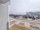 Wood balcony overlooking a neighborhood with lake views at 125 Sugar Run Dr # 26, Fuquay Varina, NC 27526