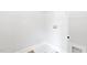 White laundry room with minimal features and hookups for a washer and dryer at 125 Sugar Run Dr # 26, Fuquay Varina, NC 27526
