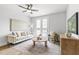 Comfortable living room with decor, neutral tones, and outdoor views through glass doors at 125 Sugar Run Dr # 26, Fuquay Varina, NC 27526