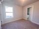 Spacious bedroom with window and ensuite bathroom at 127 Sugar Run Dr # 27, Fuquay Varina, NC 27526