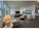 Bright living room with comfortable seating, and stylish decor at 323 Chestnut Oak Ln, Lillington, NC 27546