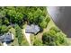 Birds eye view of house with mature landscaping, and driveway at 3309 Westcott Cir, Sanford, NC 27330