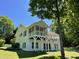 White brick home with spacious back deck perfect for outdoor relaxation and entertaining at 3309 Westcott Cir, Sanford, NC 27330