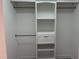 Walk-in closet featuring white built-in shelving and ample storage space at 3309 Westcott Cir, Sanford, NC 27330