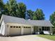 This beautiful home has a spacious two-car garage, neutral paint colors, and manicured landscaping at 3309 Westcott Cir, Sanford, NC 27330