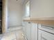 Bright bathroom featuring a walk-in shower, a white vanity, and light walls at 2633 Trifle Ln, Wake Forest, NC 27587