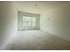 Unfinished bedroom with window, drywall, and recessed lighting at 2633 Trifle Ln, Wake Forest, NC 27587