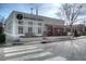 View of the Norse Brewing Company Building featuring cream colored brick, and outdoor dining at 2633 Trifle Ln, Wake Forest, NC 27587
