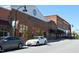 A view of White Street Brewing Company with exposed brick and large windows at 2633 Trifle Ln, Wake Forest, NC 27587