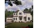 Beautiful two-story home featuring a brick and siding exterior with an attached garage at 2633 Trifle Ln, Wake Forest, NC 27587