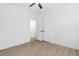 Spacious bedroom with double doors and wood-look floors at 329 Roxboro St, Haw River, NC 27258
