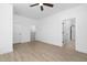 Large bedroom with hardwood floors and access to bathroom at 329 Roxboro St, Haw River, NC 27258